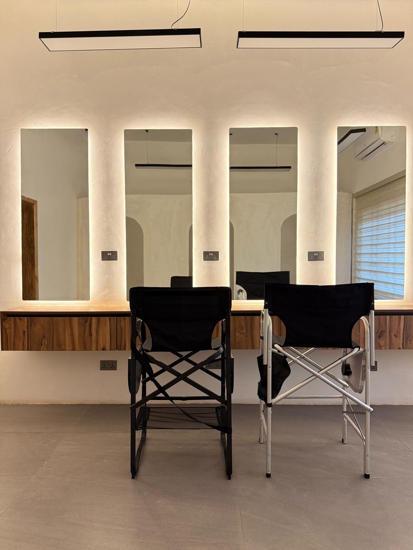 McB Studio makeup and beauty vanity space with mirrors and lighting